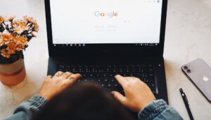man typing laptop