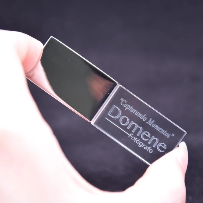 Person Holding Transparent Block USB With Logo 2