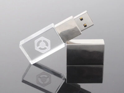 White and Clear Block USB Resting On Case