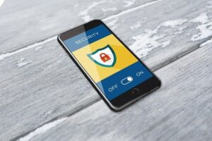 phone with cyber security on button