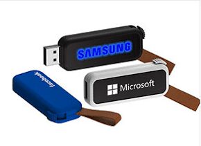 three plastic light up usbs