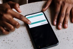 person downloading something from phone